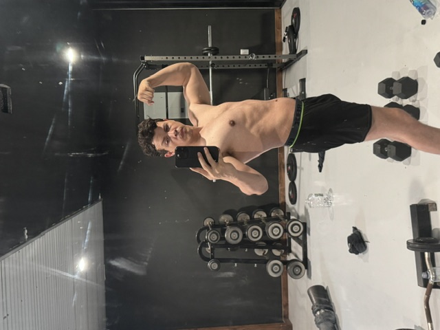 John H. after his 60-pound transformation, training at 165 lbs