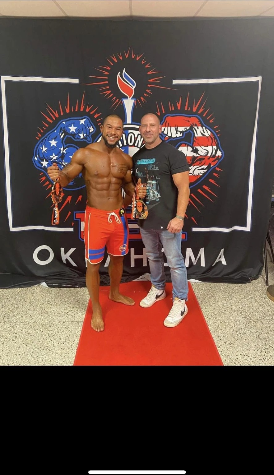 Brink Physiques coached athlete on the physique competition stage